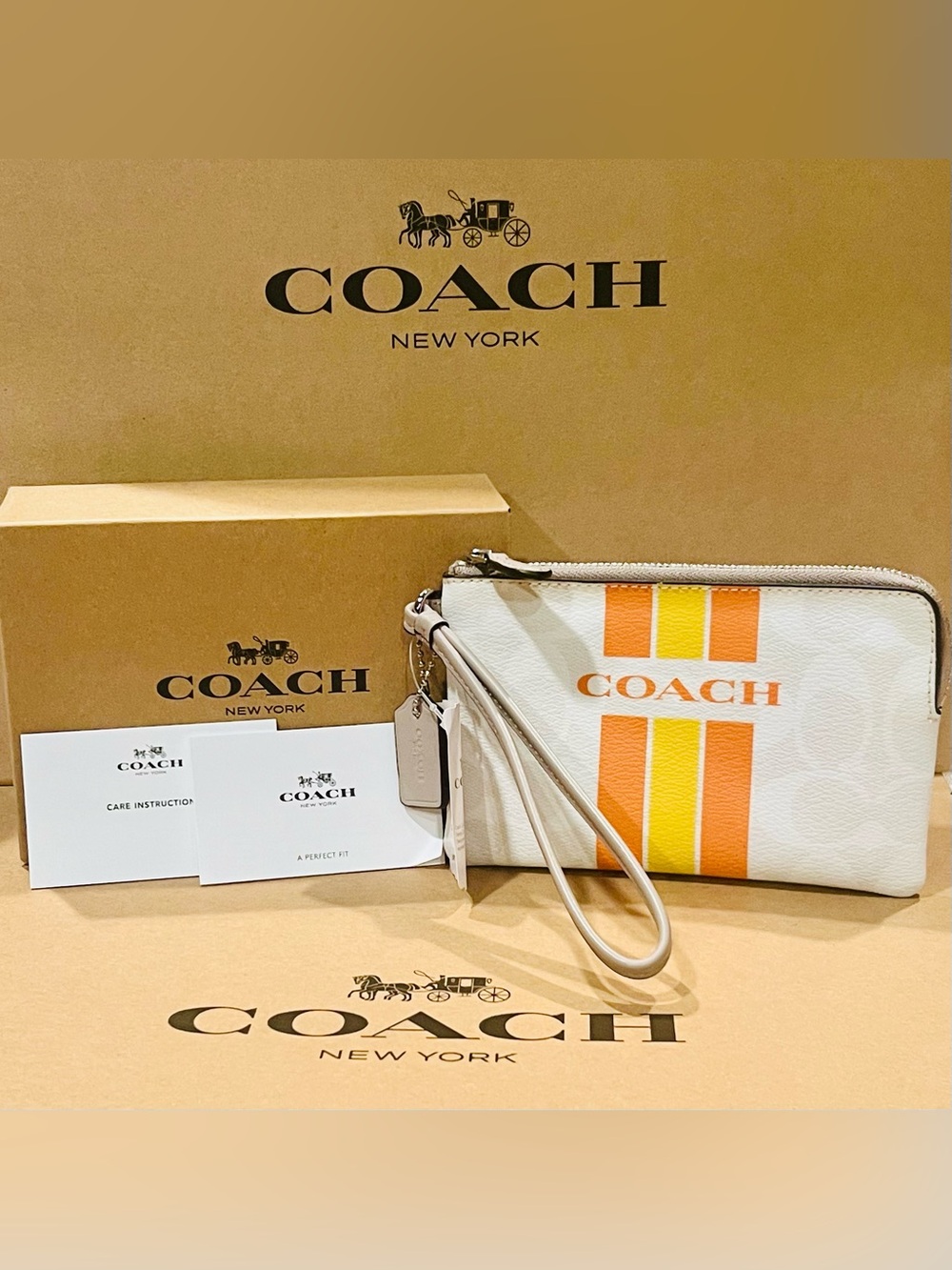 Coach Varsity Wristlet in Orange Stripe NWT